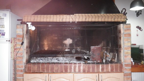 Most houses in Argentina have a grill like this in the kitchen. Awesome.